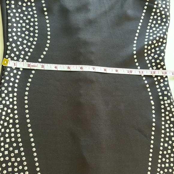 Short stretch dress with metallic stones on a black base, curvy cut, size S - Picture 9 of 10
